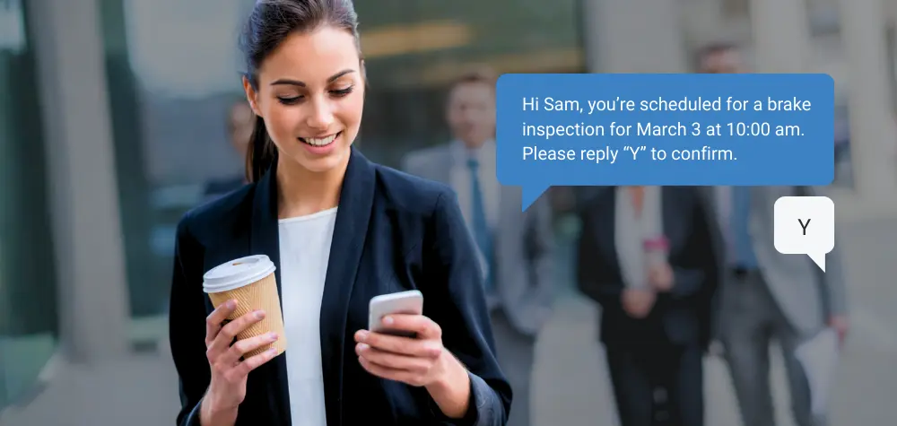 Happy customer getting a automated text from auto shop using RO Writer Connect